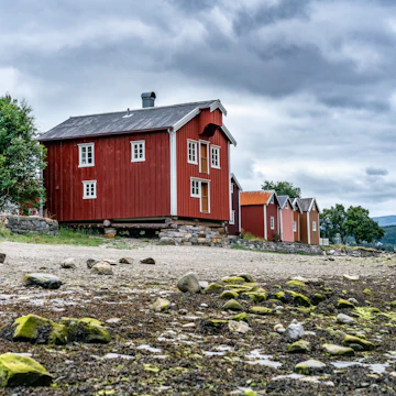 The fishermen's houses close to river Vefsna, in Sjogata, Mosjoen, Norway.