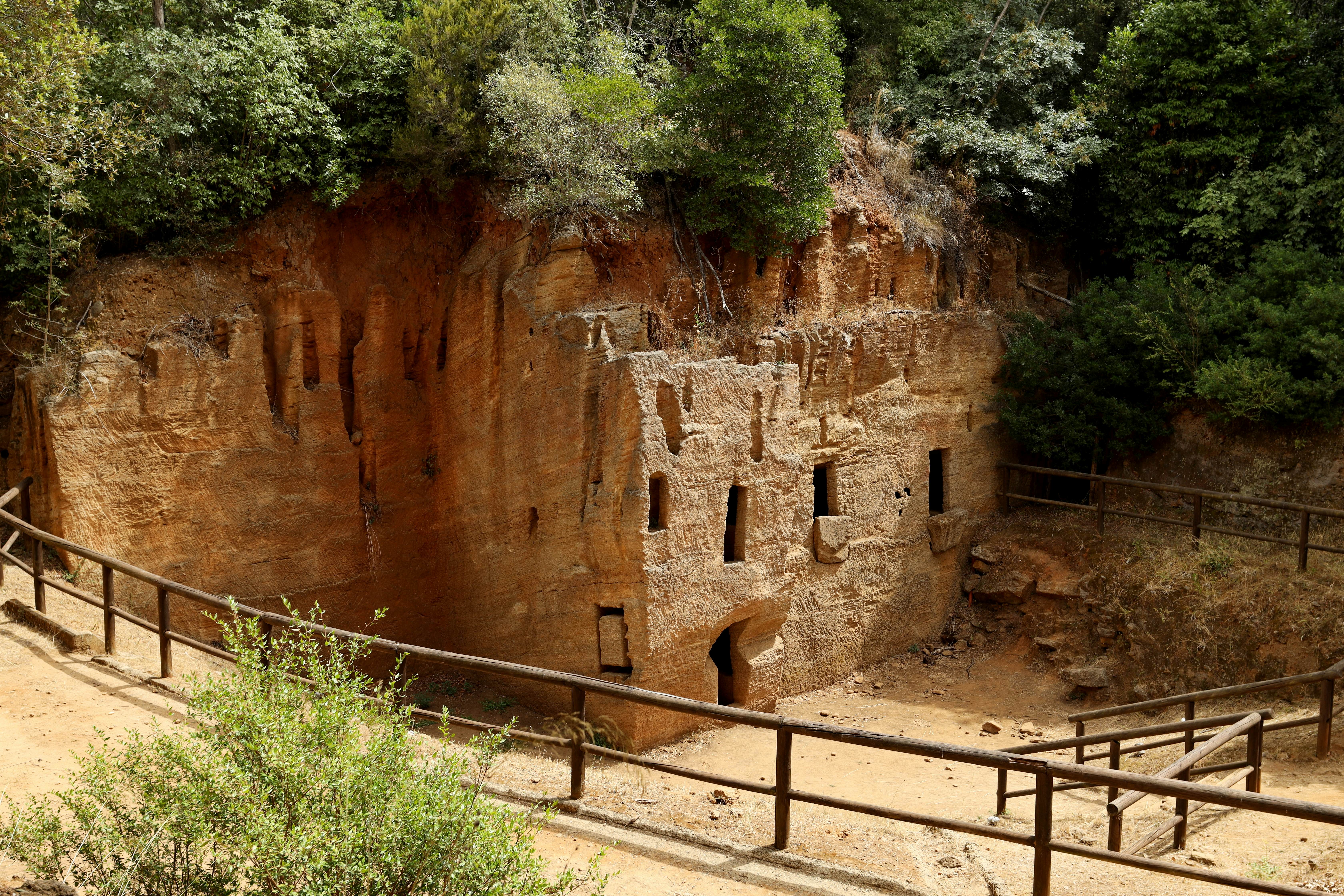 Underground chamber tombs carved into the sandstone, Etruscan Necropolis of the Caves, Populonia. They all date back to the Hellenistic period (4th - 2nd century BC). 