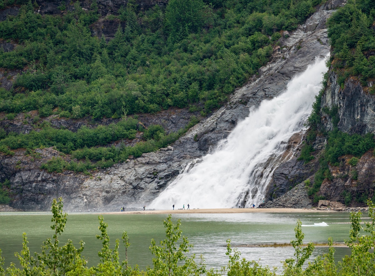 Nugget Creek falls cascade into Mendenhall Lake, close to Juneau, Alaska.