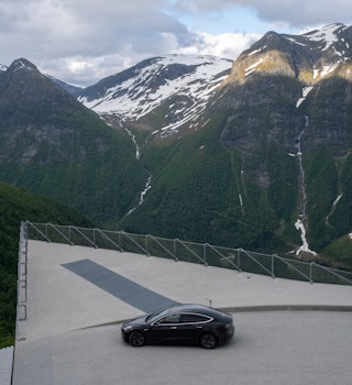 Balestrand, Norway - June 23, 2022: Gaularfjellet scenic route. A static shot of a solid black Tesla Model 3 dual motor long range with tinted windows and aero wheels. Winding roads. Selective focus; Shutterstock ID 2203948519; your: Brian Healy; gl: 65050; netsuite: Lonely Planet Online Editorial; full: best EV road trips in Europe
2203948519