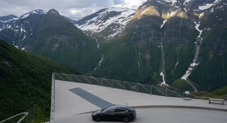Balestrand, Norway - June 23, 2022: Gaularfjellet scenic route. A static shot of a solid black Tesla Model 3 dual motor long range with tinted windows and aero wheels. Winding roads. Selective focus; Shutterstock ID 2203948519; your: Brian Healy; gl: 65050; netsuite: Lonely Planet Online Editorial; full: best EV road trips in Europe
2203948519