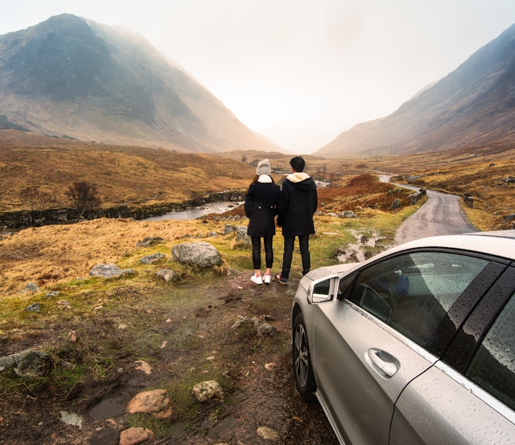 Young couple is relaxing and enjoying the view of mountain filming location of Skyfall Movies After The Rain, Glencoe valley, Scotland.; Shutterstock ID 495640633; your: Claire Naylor; gl: 65050; netsuite: Online ed; full: Scotland road trips
495640633