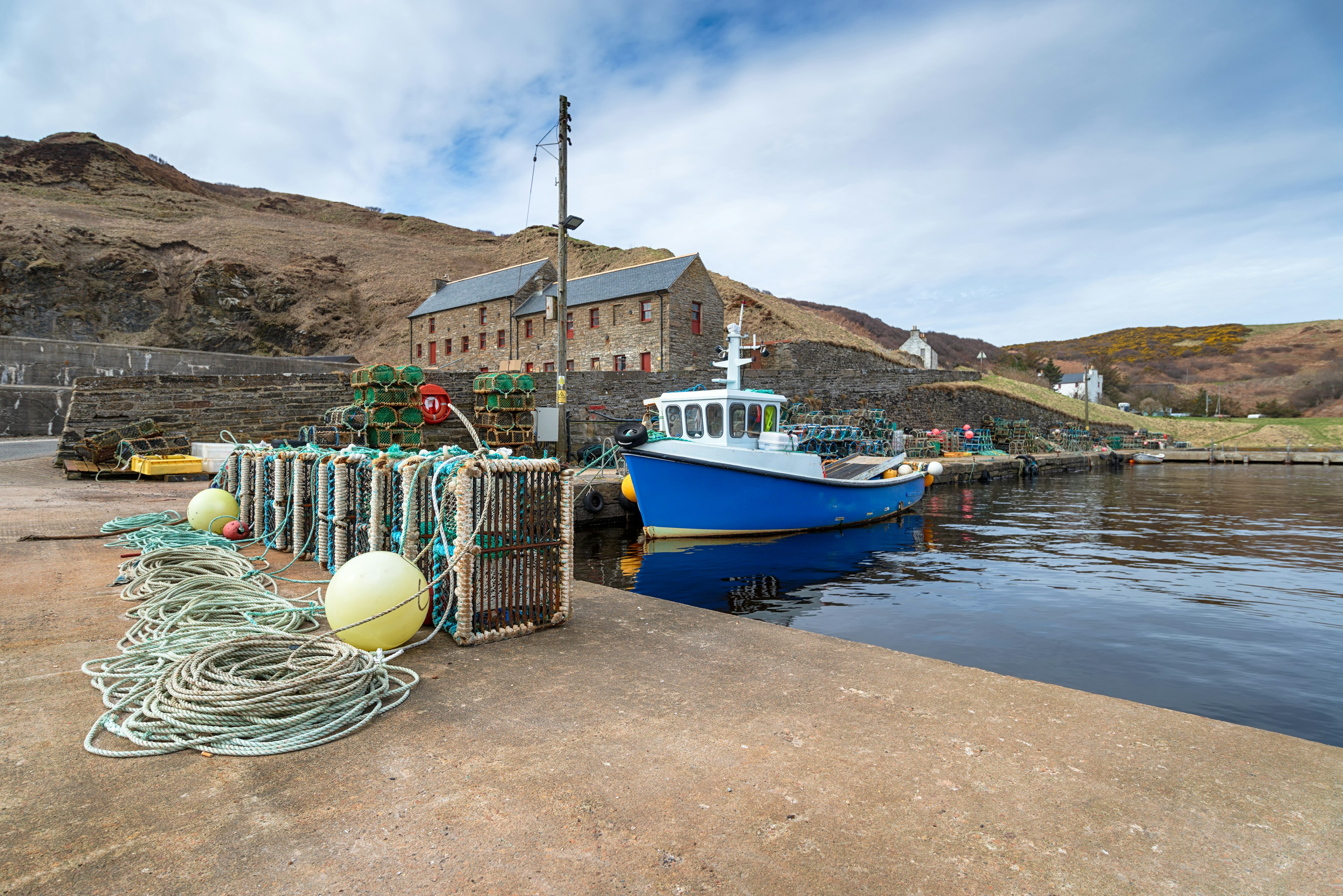 Fishing boat in the harbour at Lybster on the east coast of Scotland.