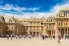 A crowd outside the Palace of Versailles on a summer day.
369300248
historical, france, versailles, cloud, travel, view, day, european, urban, landmark, sites, symbol, castle, history, touristic, palace, chateau, summer, outside, old, people, de, building, tourist, historic, front, traveler, world, place, decorative, unesco, famous, heritage, cloudy, garden, architecture, french, king, sky, tourism, art, ancient, royal, residence, nature, europe, facade