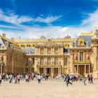 A crowd outside the Palace of Versailles on a summer day.
369300248
historical, france, versailles, cloud, travel, view, day, european, urban, landmark, sites, symbol, castle, history, touristic, palace, chateau, summer, outside, old, people, de, building, tourist, historic, front, traveler, world, place, decorative, unesco, famous, heritage, cloudy, garden, architecture, french, king, sky, tourism, art, ancient, royal, residence, nature, europe, facade