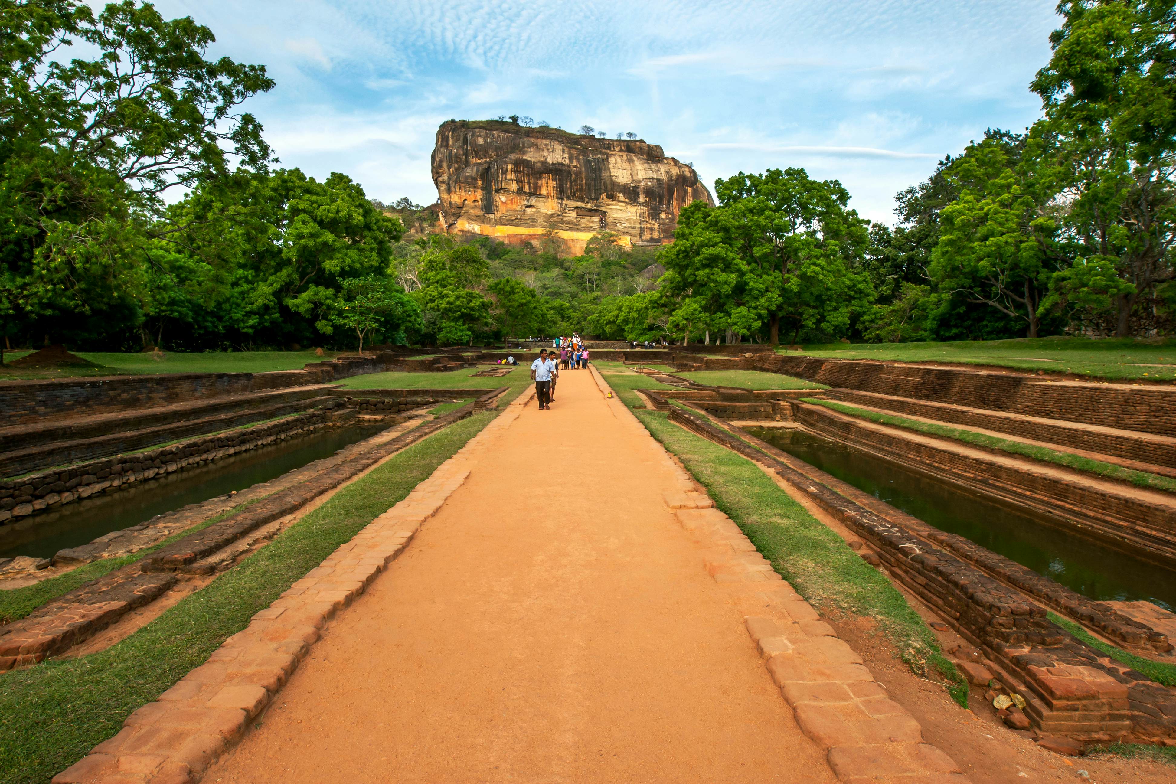 View from the ancient Royal Gardens towards Sigiriya Rock, also known as the Lion Rock Fortress. The gardens date from King Kassapa between AD 477 and 485.