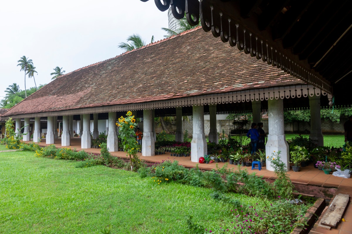 The gardens, lawn and pillars of the local popular Nupe Market, a grand old historical Dutch colonial building and center of trade for centuries. 