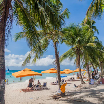 People enjoy White Beach at Boracay island, Philippines.