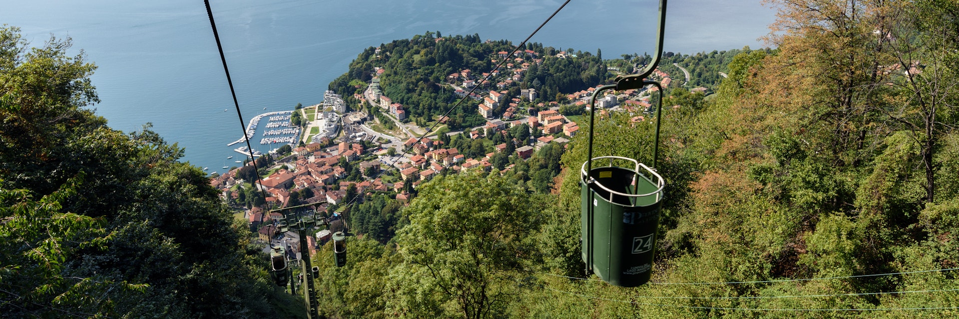 Two-seat cable cars take you gently up almost to the summit of Sasso del Ferro mountain, from where you can admire a magnificent view over Lake Maggiore.