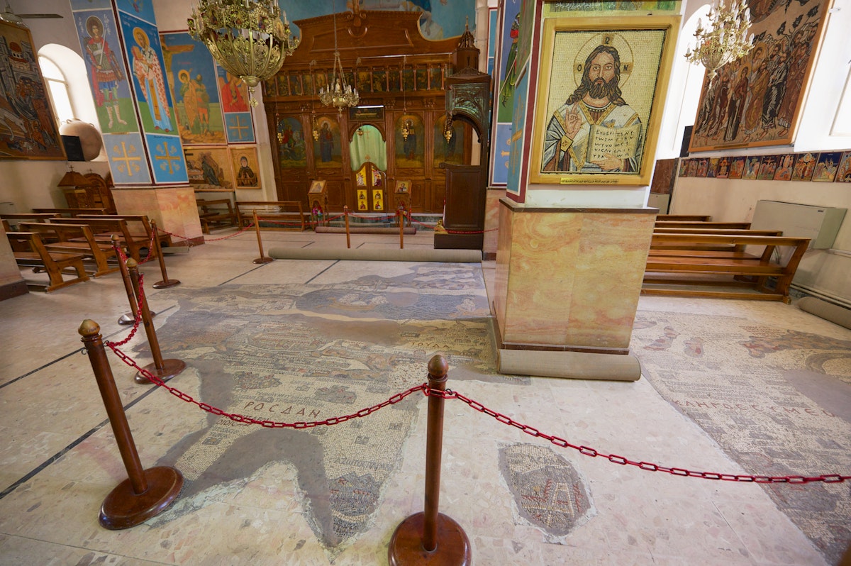 Interior of Greek Orthodox Basilica of St George with the mosaic map of Holy Land in Madaba, Jordan.