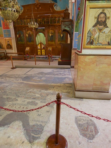 Interior of Greek Orthodox Basilica of St George with the mosaic map of Holy Land in Madaba, Jordan.