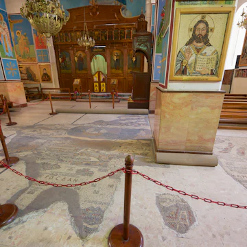 Interior of Greek Orthodox Basilica of St George with the mosaic map of Holy Land in Madaba, Jordan.
