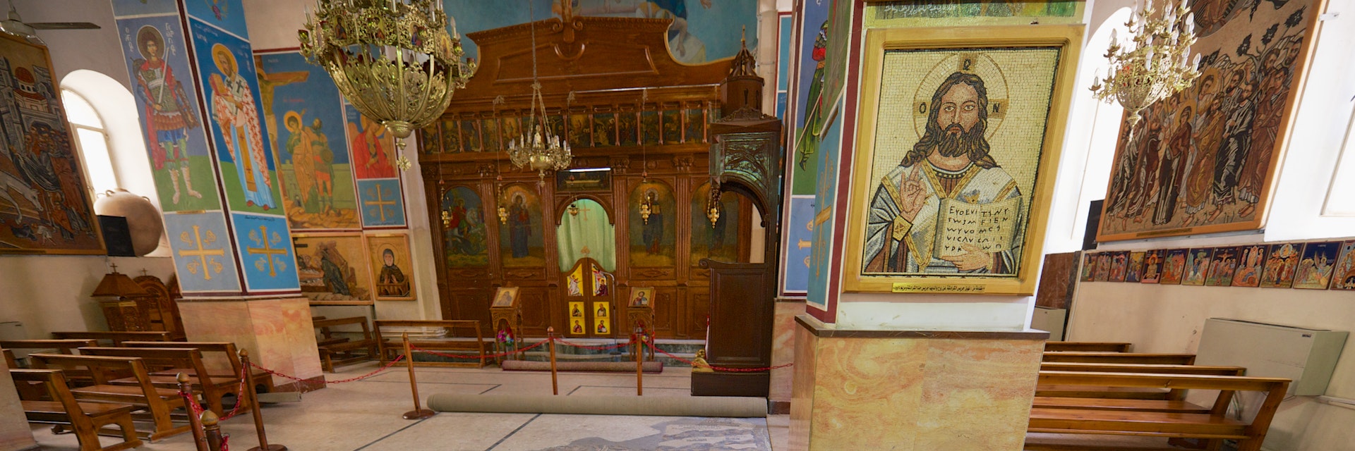 Interior of Greek Orthodox Basilica of St George with the mosaic map of Holy Land in Madaba, Jordan.
