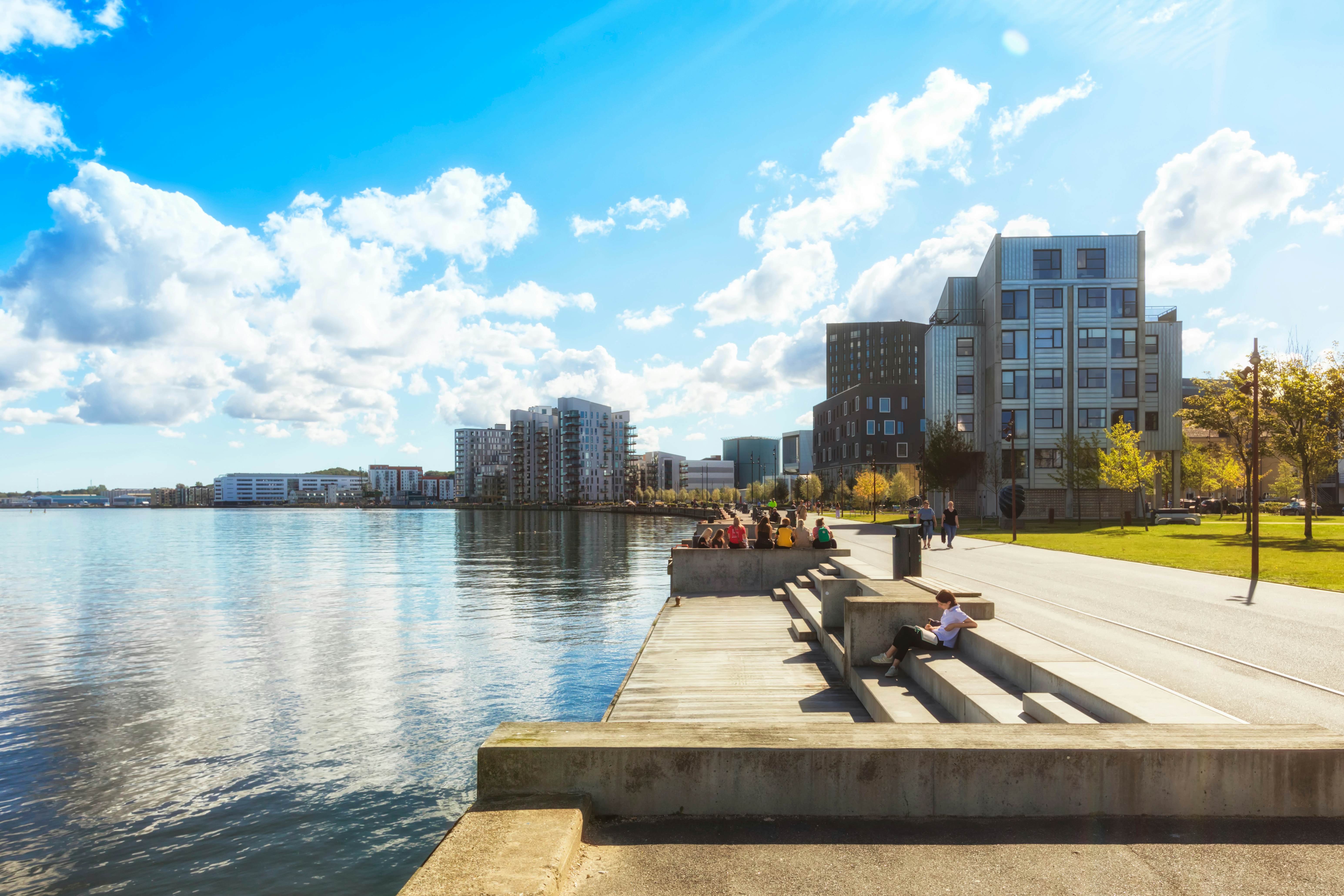Waterfront of Aalborg around Østre Havn quarter and Musikkens Hus, view from the boardwalk on Limfjord shore.