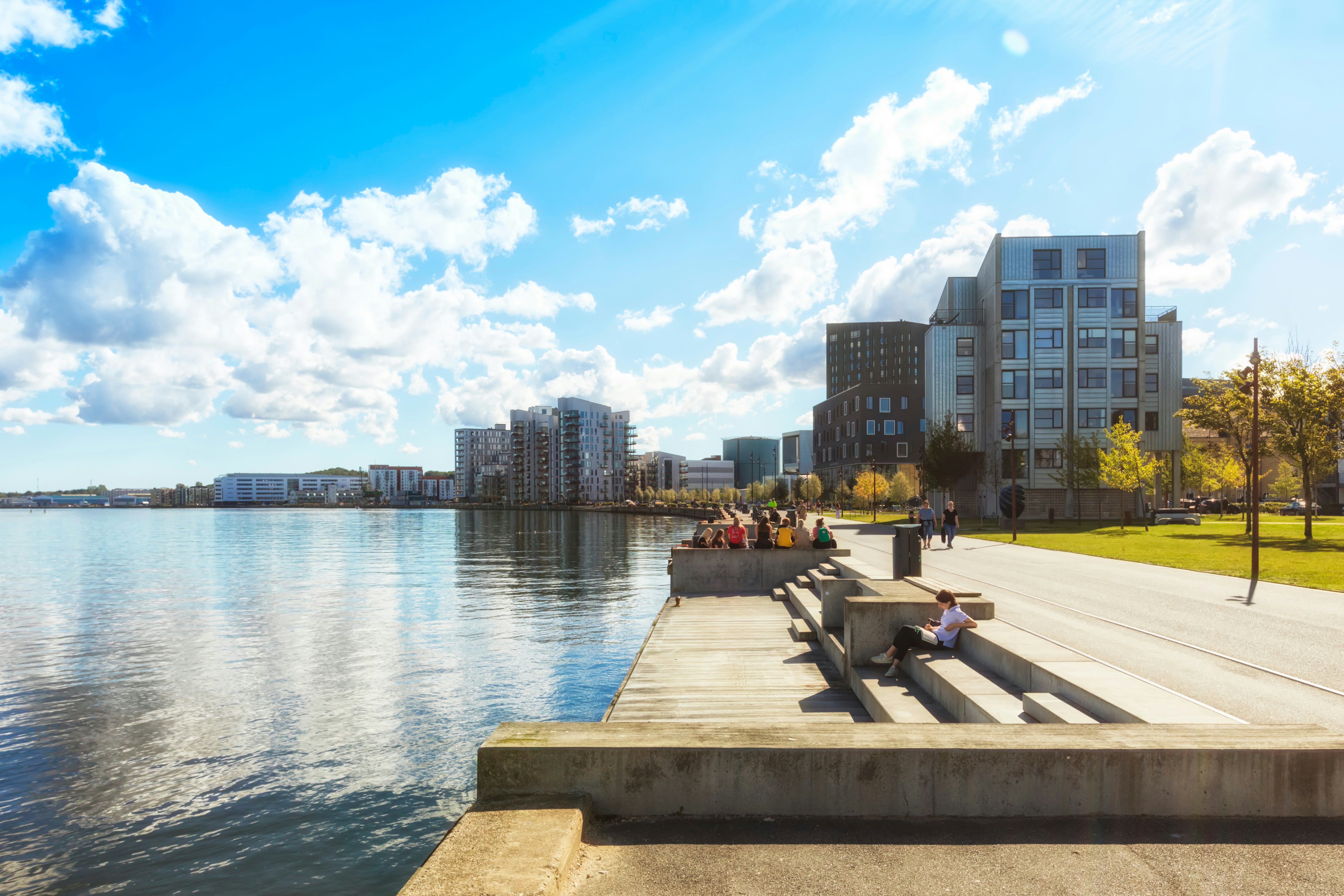 Waterfront of Aalborg around Østre Havn quarter and Musikkens Hus, view from the boardwalk on Limfjord shore.