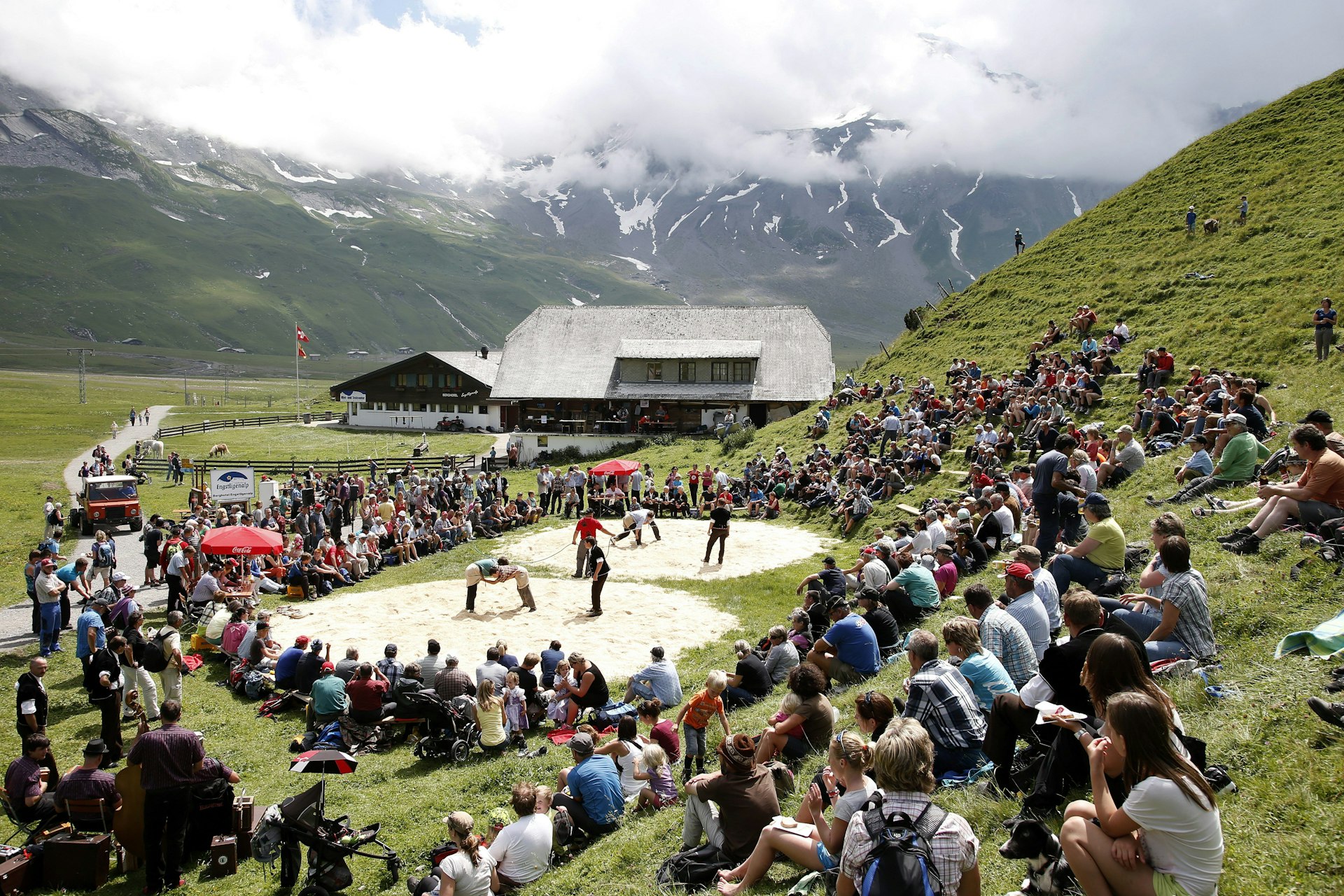 Spectators Watch Swiss Wrestling Fights (schwingen) on the Engstligenalp Near Adelboden Switzerland 
