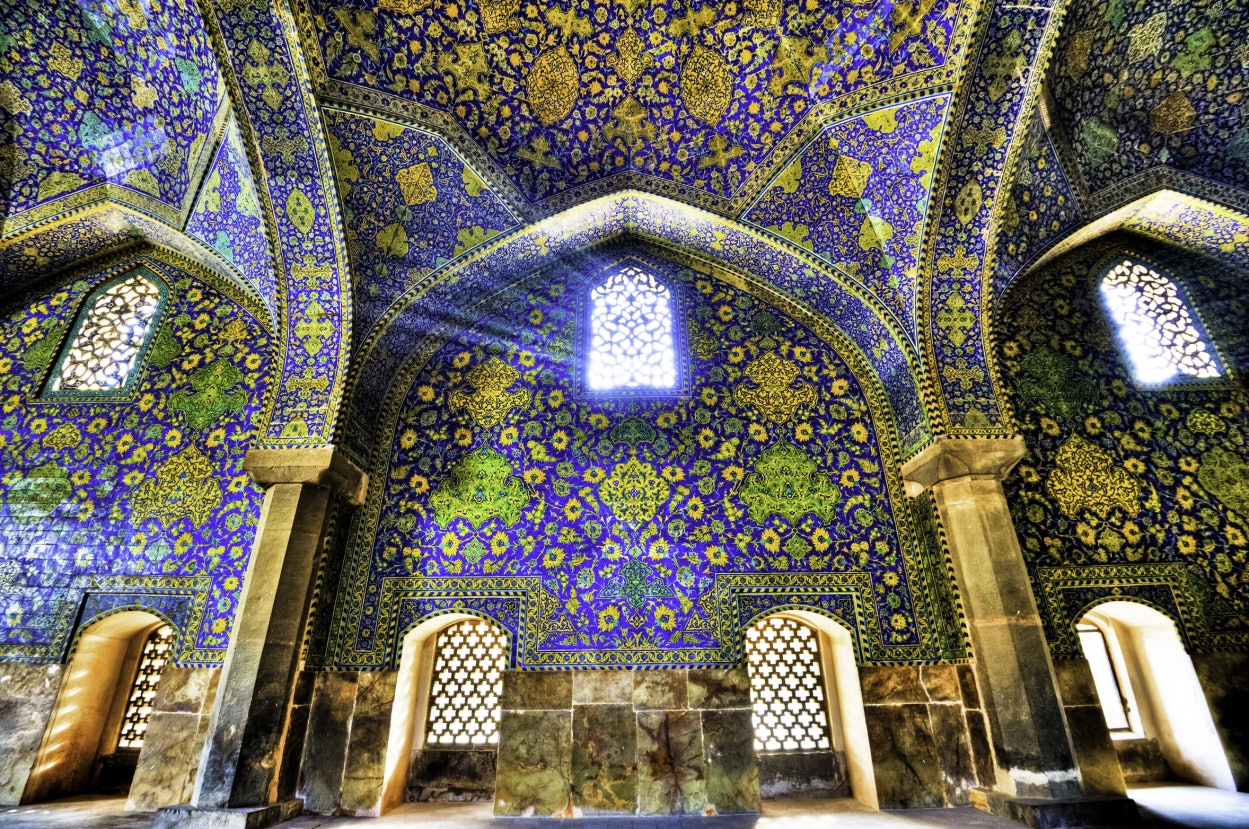 Imam Mosque at Naqhsh-e Jahan Square in Isfahan, Iran. Imam mosque is known as Shah Mosque. Its construction finished in 1629.; Shutterstock ID 92388088; Your name (First / Last): Lauren Keith; GL account no.: 65050; Netsuite department name: Online Editorial; Full Product or Project name including edition: Middle East Online Highlights Update
ancient, arch, architecture, art, building, culture, dark, decoration, design, dome, east, esfahan, heritage, historic, holy, imam, inner, inside, interior, iran, iranian, isfahan, islam, islamic, jahan, light, masjid, mosque, muslim, naqsh-e, old, ornament, pattern, persia, persian, pray, religion, sacred, shah, shine, sight, site, square, structure, sunlight, sunny, tile, traditional, vintage, wall