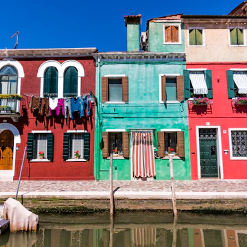 Colourful row houses by canal, Burano.
burano, cityscape, clear, color, europe, home, house, inviting, italia, italy, row, travel, venice, warm