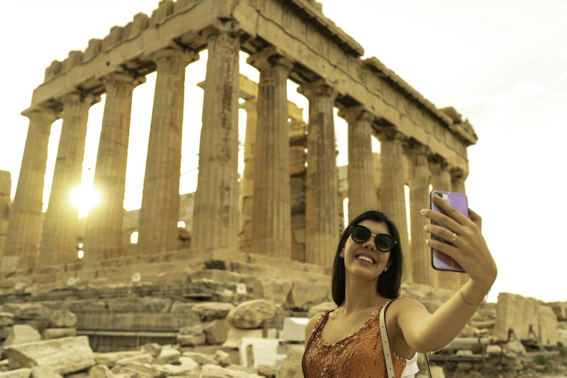 Young Woman Taking A Selfie In Front Of The Parthenon