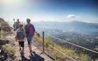 Family walking on the summit of Mount Vesuvius volcano in Campania, Italy. View of the gulf of Naples and the Lattari Mountains...Sunny summer day...Nikon D850
1185673790