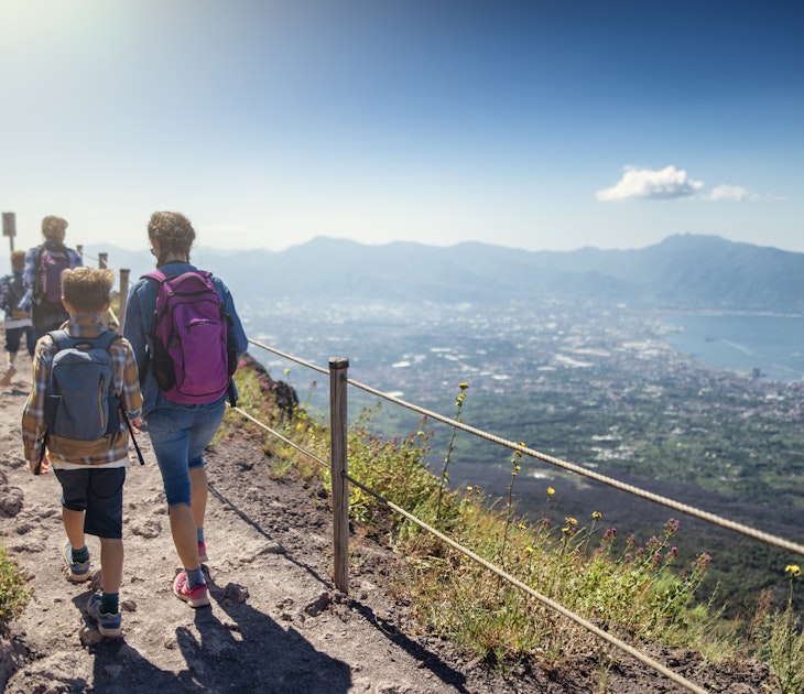 Family walking on the summit of Mount Vesuvius volcano in Campania, Italy. View of the gulf of Naples and the Lattari Mountains...Sunny summer day...Nikon D850
1185673790