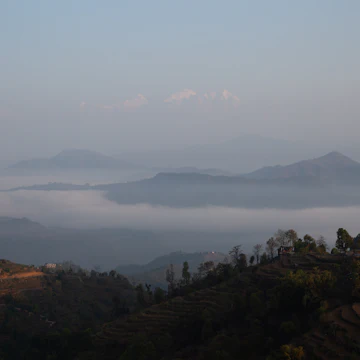 Views of the Himalayas at dawn from The Thani Mai Temple Viewpoint in Bandipur.