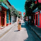 Young woman walking on a colorful street in old city of Cartagena, Colombia
1408955173