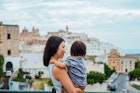 Young Asian mother looking at view with her little girl in the old town of Ostuni, Puglia, Italy, with her toddler daughter. Little explorer seeing the world with her mother. Mother-daughter bonding time.
1434538576