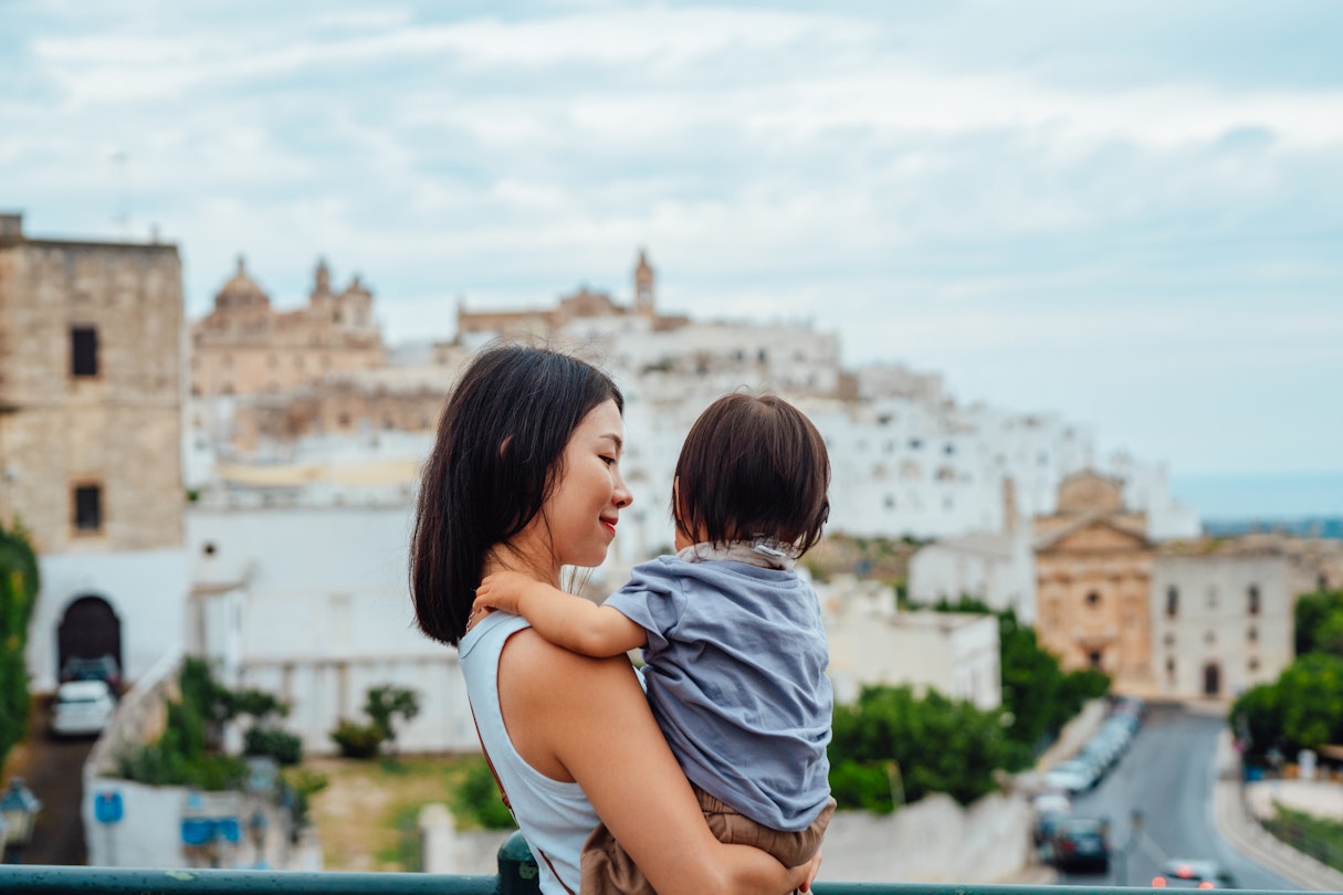 Young Asian mother looking at view with her little girl in the old town of Ostuni, Puglia, Italy, with her toddler daughter. Little explorer seeing the world with her mother. Mother-daughter bonding time.
1434538576