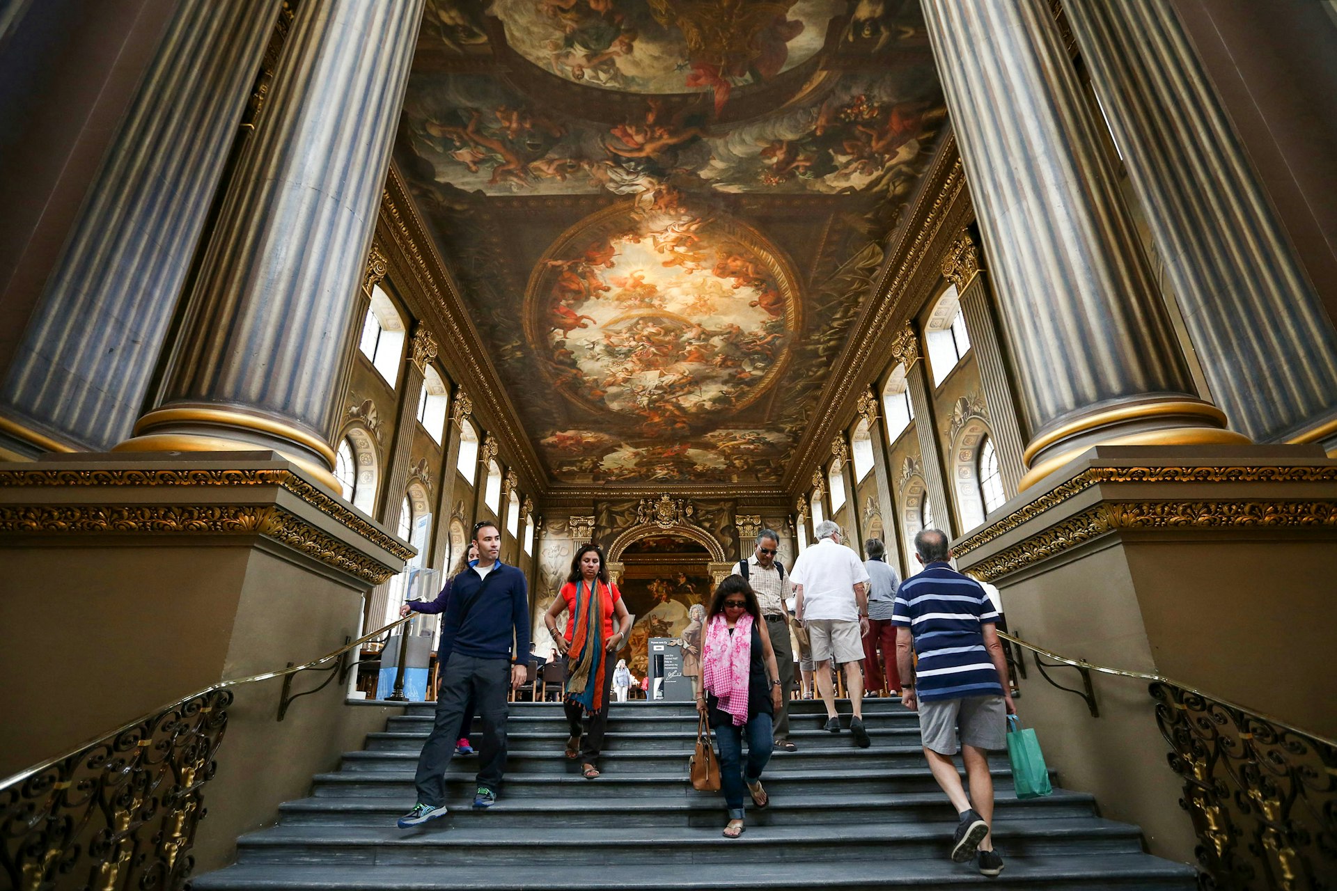 Visitors view the Painted Hall in the Old Royal Naval College on July 22, 2015 in Greenwich, England. 