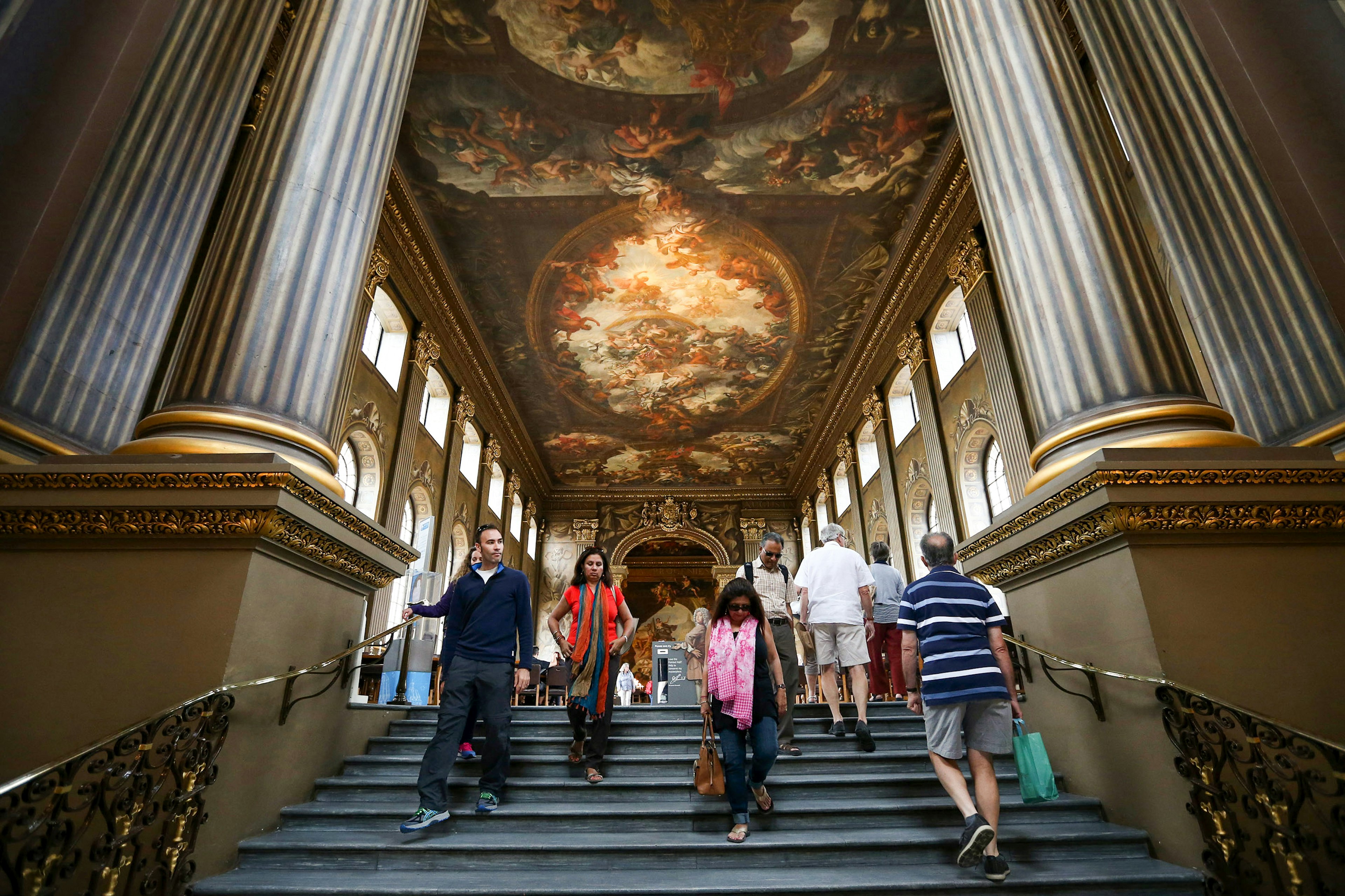 Visitors view the Painted Hall in the Old Royal Naval College on July 22, 2015 in Greenwich, England.