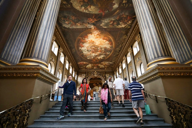 Visitors view the Painted Hall in the Old Royal Naval College on July 22, 2015 in Greenwich, England.