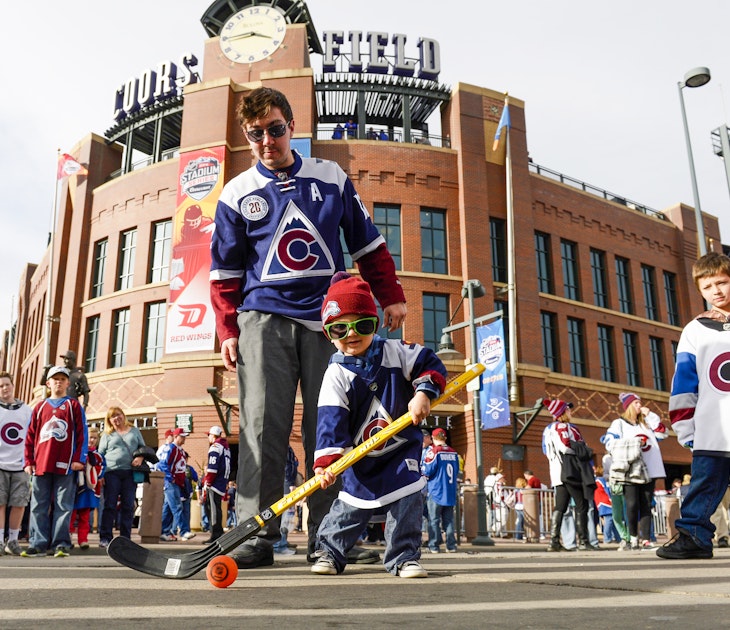 DENVER, CO - February 27: Theodore Jones, 3, tests his hockey skills under the watchful eye of his father Matt Jones out in front of Coors Field before the NHL Stadium Series game featuring the Colorado Avalanche and the Detroit Redwings February 27, 2016. (Photo by Andy Cross/The Denver Post via Getty Images)
512719700
Matt Jones; Theodore Jones