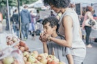 519518907
35-39 years, 8-9 years, affection, african-american ethnicity, afro, apple, arm around, background people, basket, bonding, boy, boys, browsing, brunette, buying, caucasian, childhood, color image, consumerism, customer, day, domestic life, elementary age, enjoying, family with one child, farmers market, food and drink, happy, head and shoulders, healthy eating, healthy living, holding, horizontal, lifestyle, love, merchandise, mid adult, mid adult women, mixed race person, mother, nature, one parent, outdoors, people, photography, retail, seattle, selecting, selective focus, shopper, shopping, smiling, son, standing, together, two people, united states, washington, woman
A mother and son shopping at a farmers market in Seattle