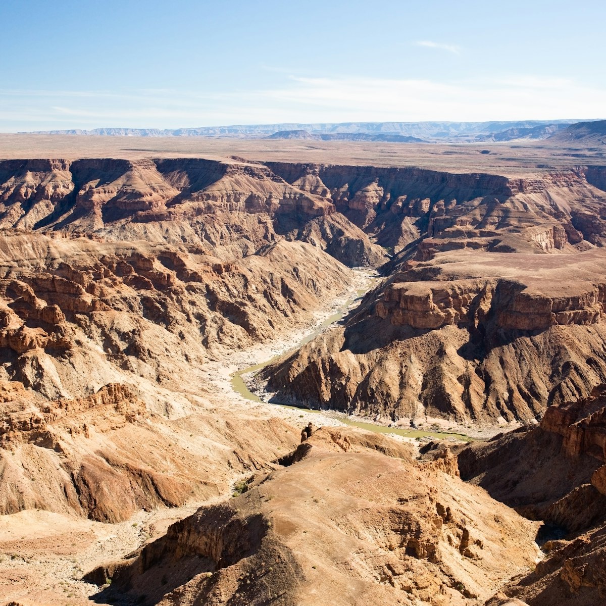 146817441
Africa; Barren; Drought; Dry; Extreme Terrain; Landscape; Outdoors; Weather; Arid Climate; Deep; Desert; Horizontal; Nature; No People; Remote; Scenics; Travel Destinations; Canyon; Fish River Canyon; Majestic; Photography; Namibia; Ravine;
Fish River Canyon in Namibia, the second largest canyon in the world