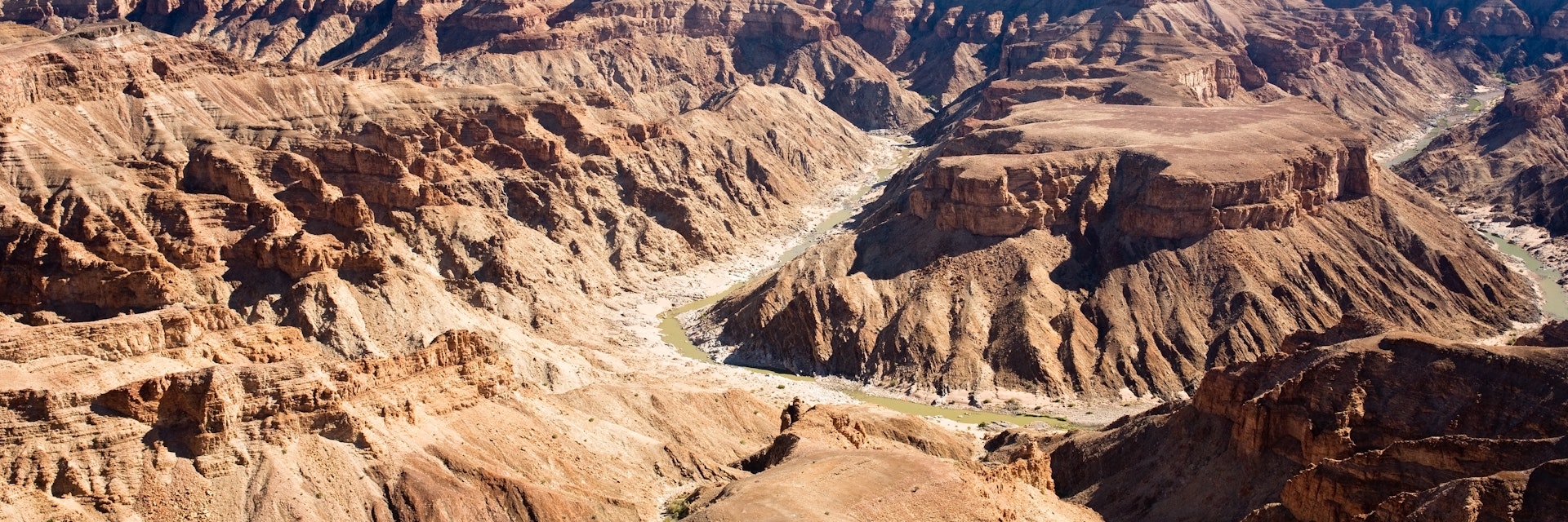 146817441
Africa; Barren; Drought; Dry; Extreme Terrain; Landscape; Outdoors; Weather; Arid Climate; Deep; Desert; Horizontal; Nature; No People; Remote; Scenics; Travel Destinations; Canyon; Fish River Canyon; Majestic; Photography; Namibia; Ravine;
Fish River Canyon in Namibia, the second largest canyon in the world