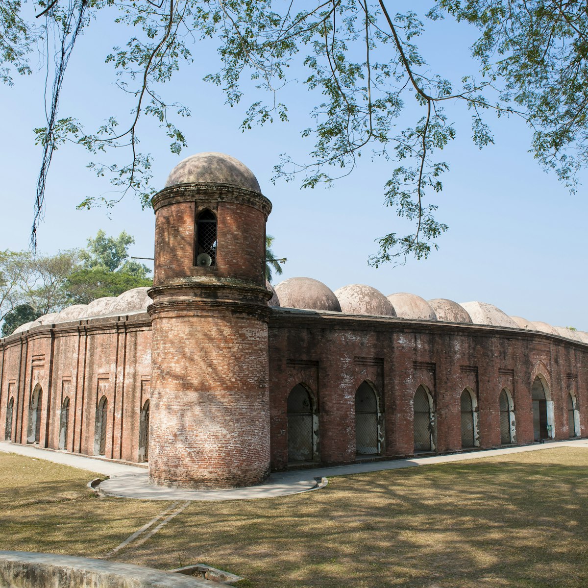 172475612
Antiquities; Asia; bagerhat; Bangladesh; Bangladeshi Culture; Benglalese; Cultures; Famous Place; Shait Gumbad Mosque; Social History; Travel Destinations; History; Horizontal; Islam; UNESCO World Heritage Site; Mosque; No People; Photography; Religion;
Exterior of the Sixty Dome Mosque (Sha Gombuj Moshjid), a UNESCO World Heritage site.