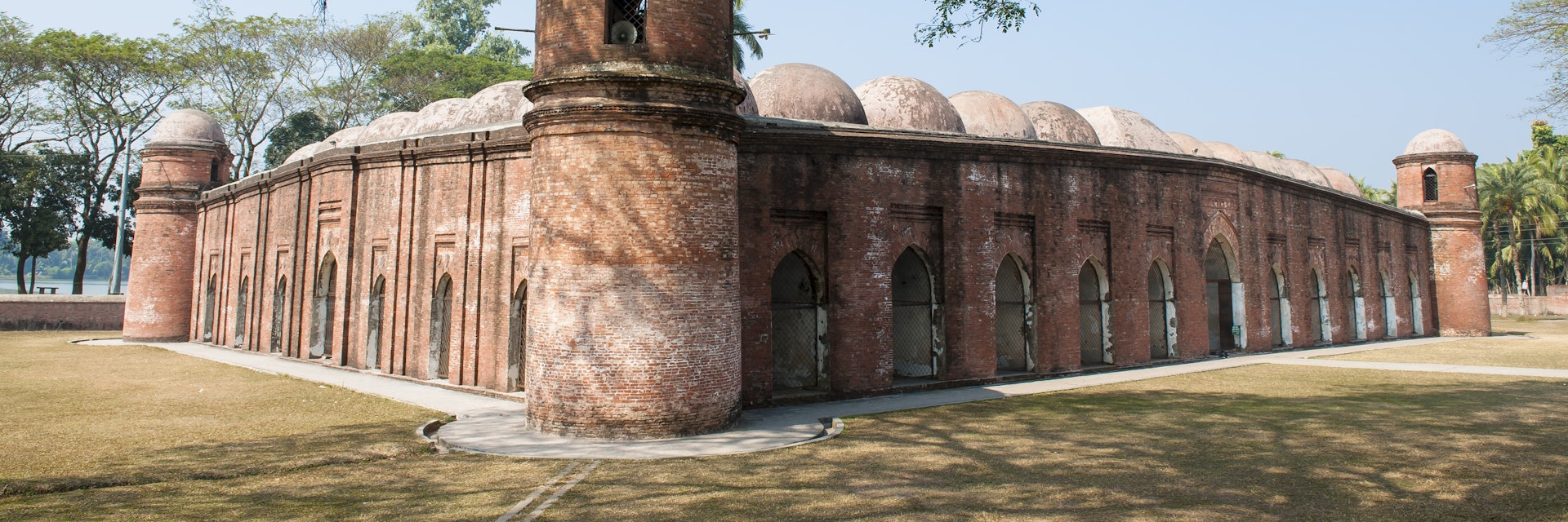 172475612
Antiquities; Asia; bagerhat; Bangladesh; Bangladeshi Culture; Benglalese; Cultures; Famous Place; Shait Gumbad Mosque; Social History; Travel Destinations; History; Horizontal; Islam; UNESCO World Heritage Site; Mosque; No People; Photography; Religion;
Exterior of the Sixty Dome Mosque (Sha Gombuj Moshjid), a UNESCO World Heritage site.