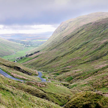 From Glencolumbkille a road heads inland towards Ardara, through the Glengesh Pass.
506578055
Mountain Pass, Sheep, County Donegal, Outdoors, Road, Ardara, Cloud - Sky, Majestic, No People, Green, Green Color, Horizontal, Grass, Light, Glencolumbkille, Light - Natural Phenomenon, Photography, Republic of Ireland, Idyllic, Uncultivated