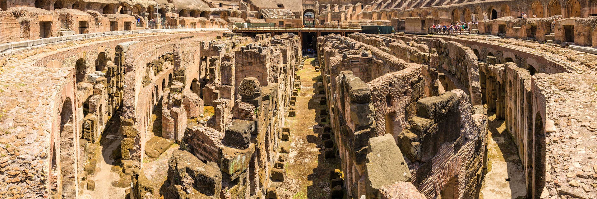 Inside the Colosseum, an amphitheater located in Ancient Rome.
614830518
Lazio, Color Image, Travel Destinations, Horizontal, Panoramic, Famous Place, Photography, Amphitheater, Rome - Italy, Italy, Capital Cities, Roman, Coliseum - Rome, Europe, Monument, Old Ruin, Built Structure, Indoors, Ruin, Innovation, Rome