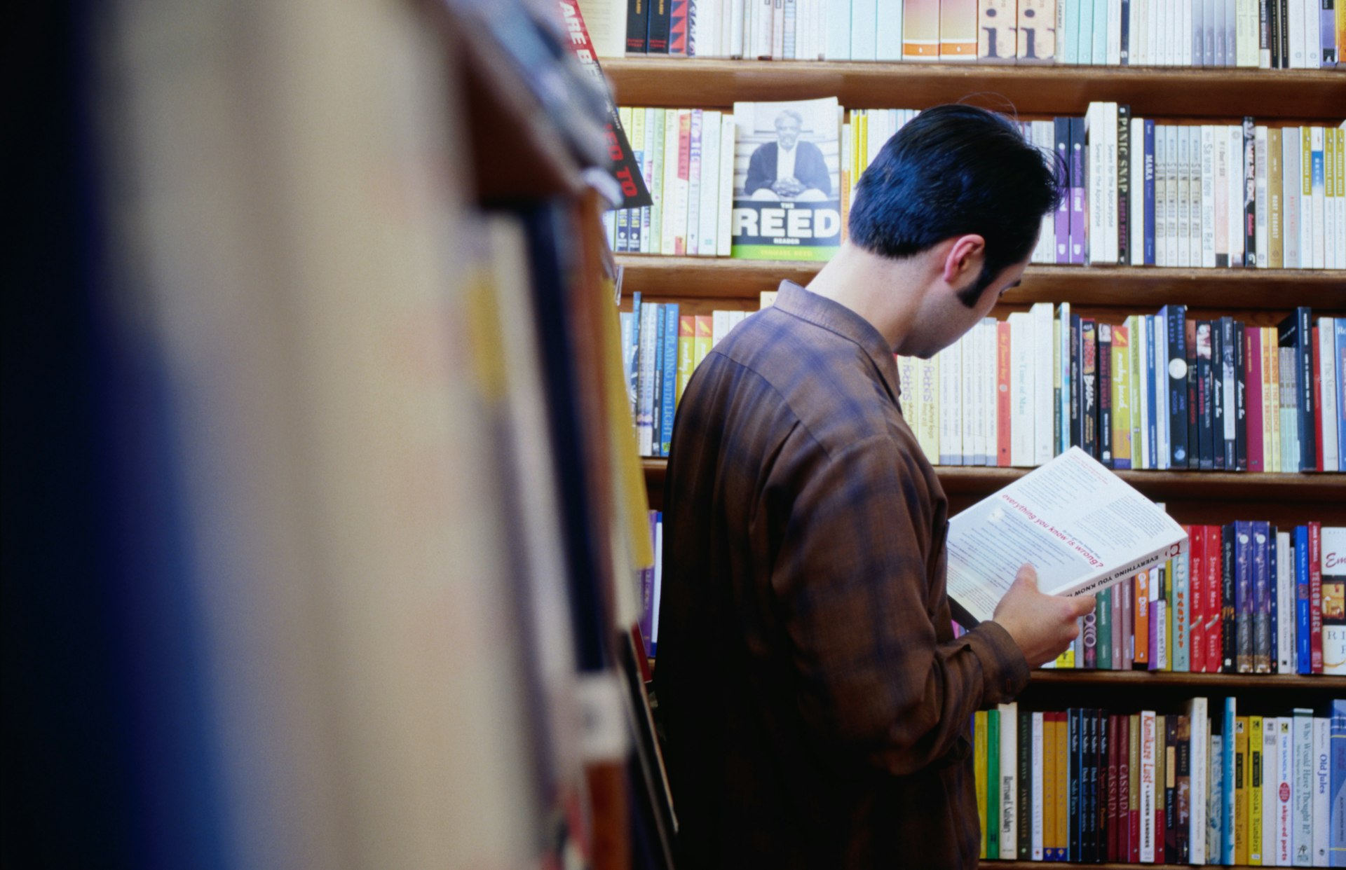 A person reading at the City Lights Bookstore in San Francisco