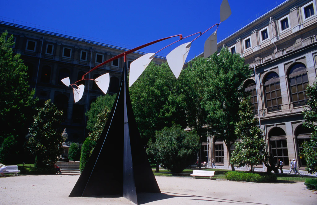 A large freestanding sculpture in an outdoor courtyard at the Centro de Arte Reina Sofia