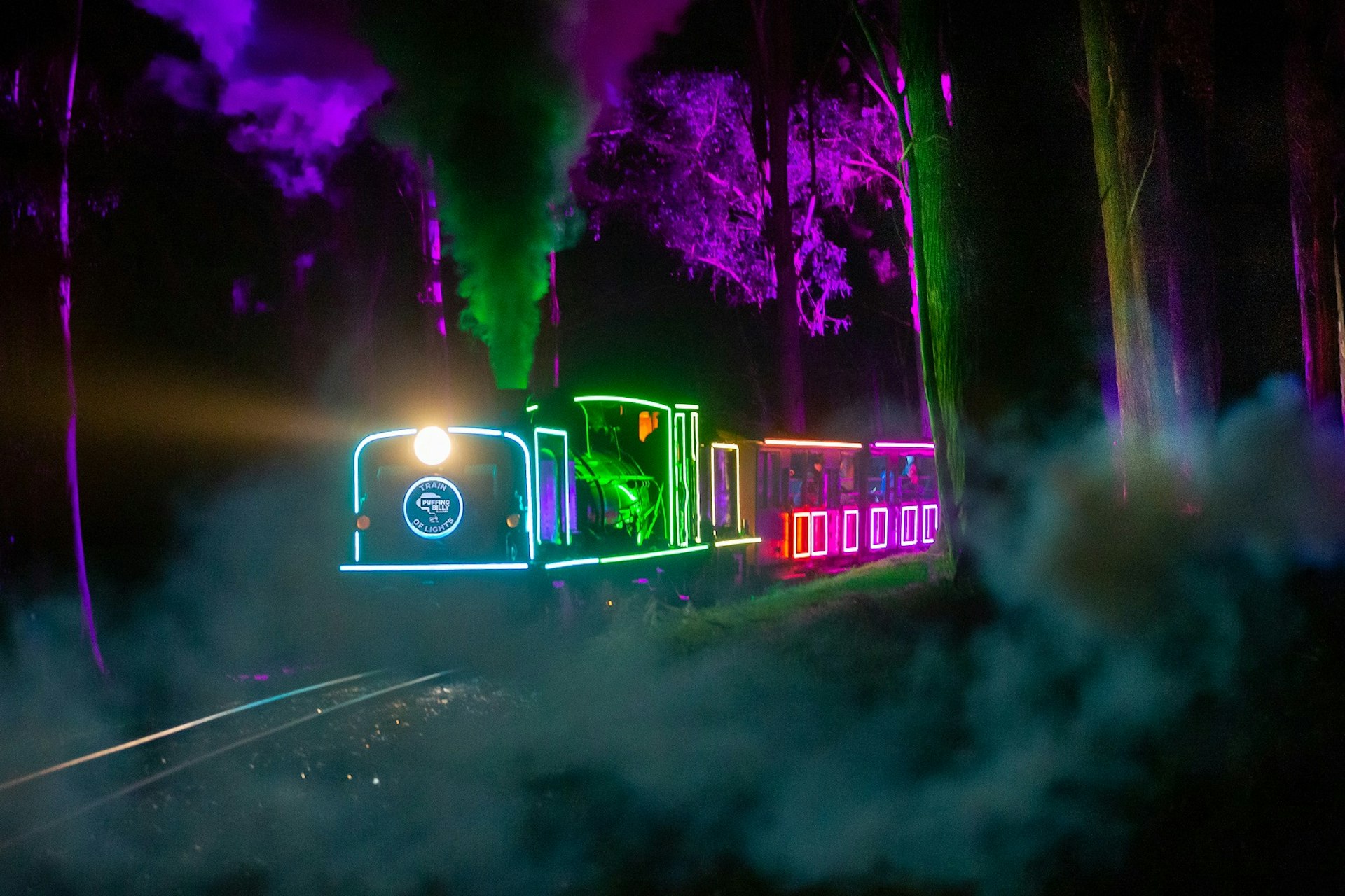 Train of Lights showing the Puffing Billy steam train lit up with neon lights