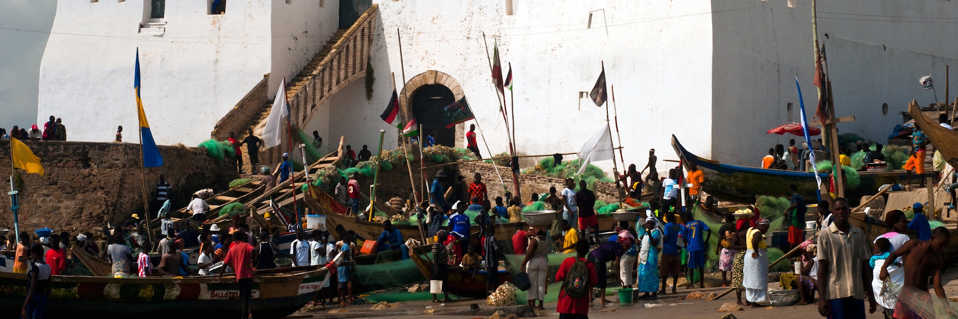 Fishing boats and Cape Coast castle