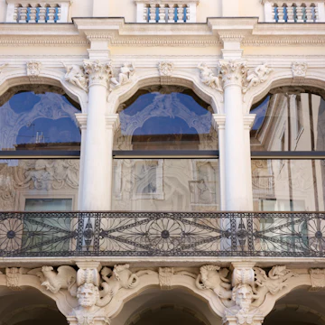 Richly decorated Hercules Loggia in the inside courtyard of the Leoni Montanari Palace.