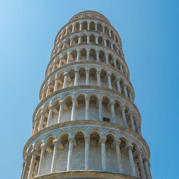 The last of the three major buildings on the piazza to be built, construction of the bell tower began in 1173 and took place in three stages over the course of 177 years, with the bell-chamber only added in 1372. Five years after construction began, when the building had reached the third floor level, the weak subsoil and poor foundation led to the building sinking on its south side
1264707656