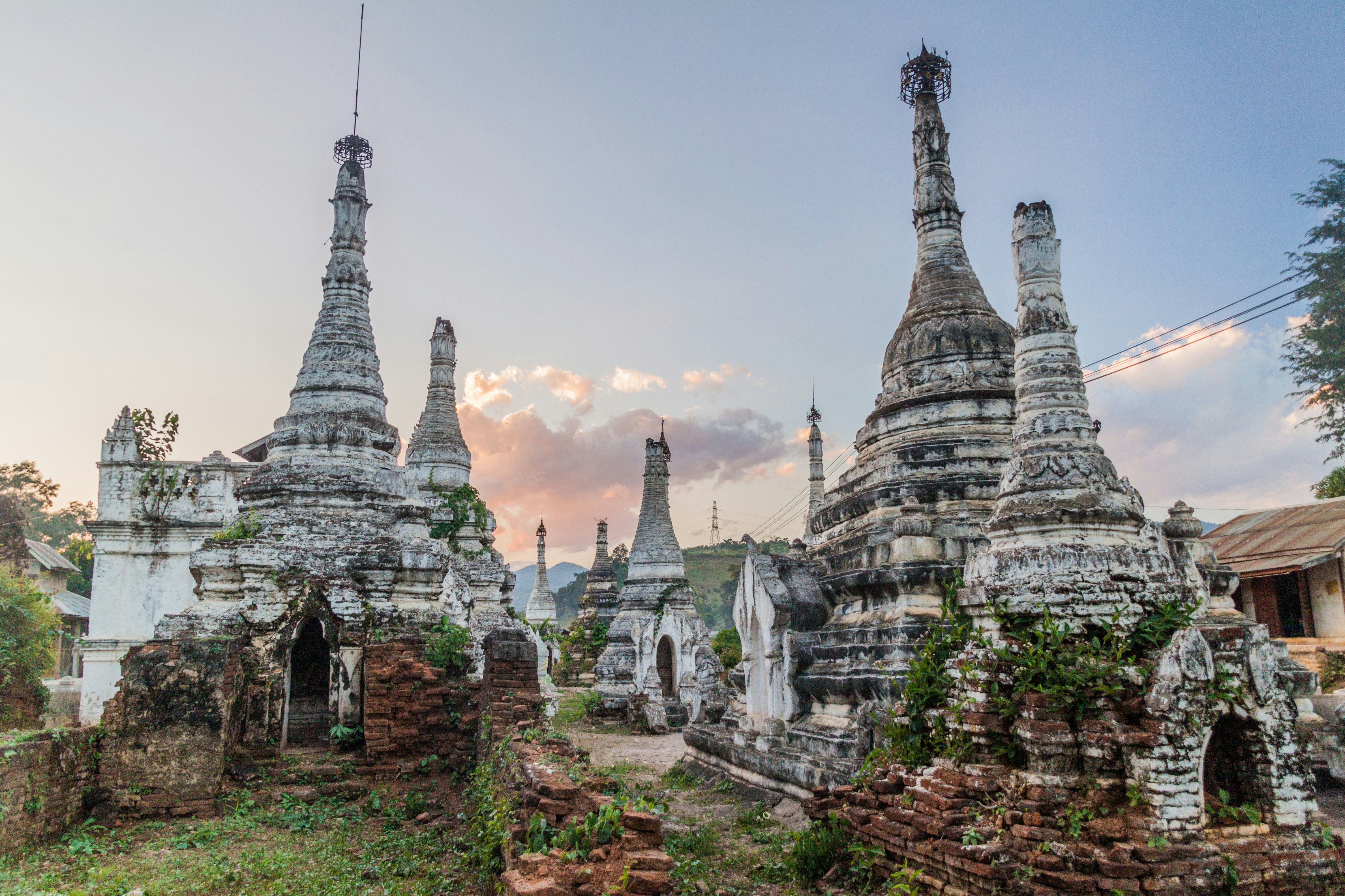 Old white stupas in Myauk Myo neighborhood of Hsipaw, Myanmar.