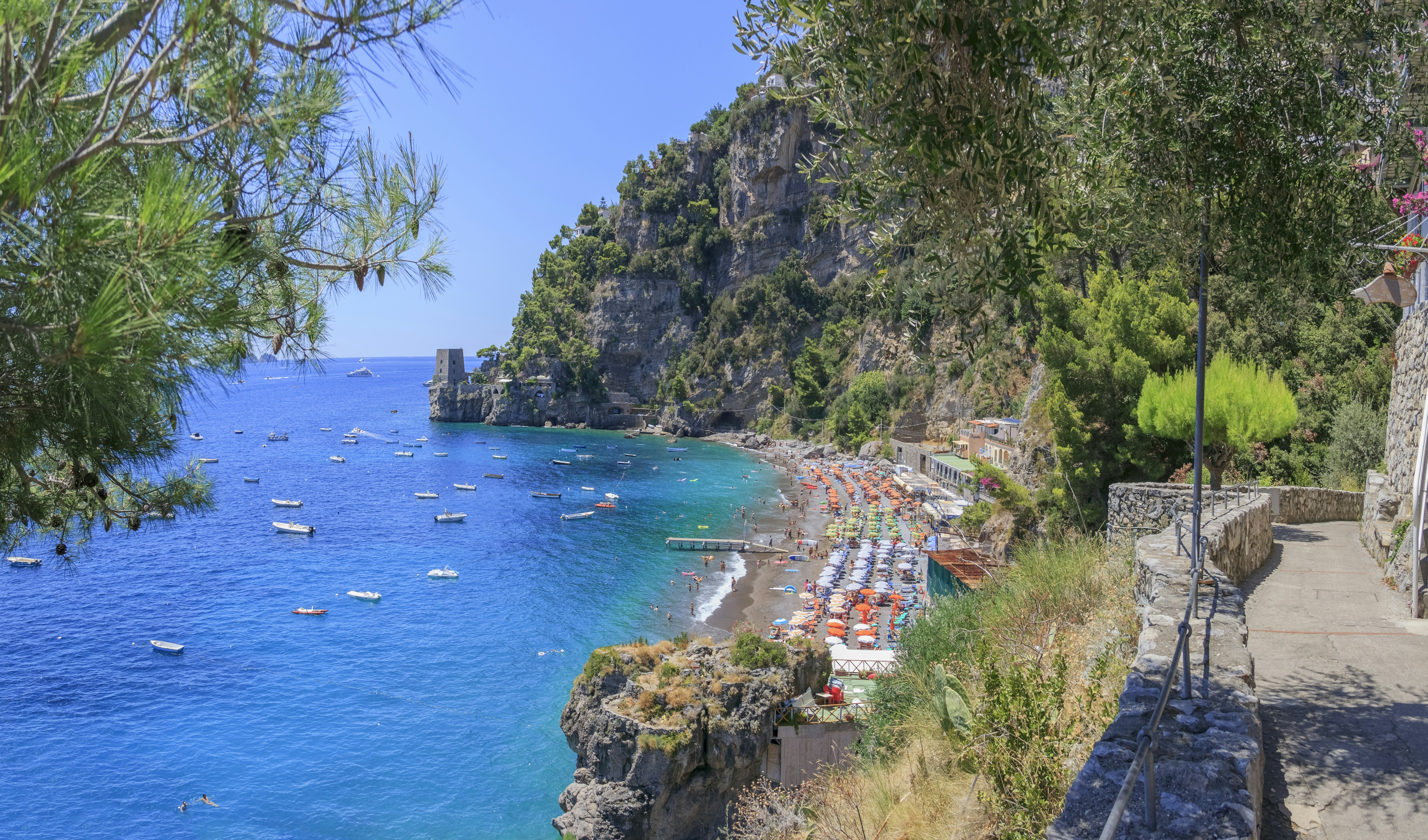 A pathway leads over to the Fornillo Beach, a more peaceful place to lay out your beach blanket and enjoy the surf and sun. You can also take a water taxi to one of the many coves and sandy spots that dot the cliffs that are reachable only by boat.Positano is a seductive place. Terraces shore up the buildings and almost every turn offers a visual bounty to enjoy. The most prevalent point of references is the colorful tiled dome of the Church of Santa Maria Assunta, in the smack-middle of town. Everything else tumbles down toward the water from here. The beach at the marina is known as Spiaggia Grande (big beach) because it is one of the Amalfi Coast's largest. This is the central seafront for the town and there are several excellent seafood restaurants just above the beach.
1332917250