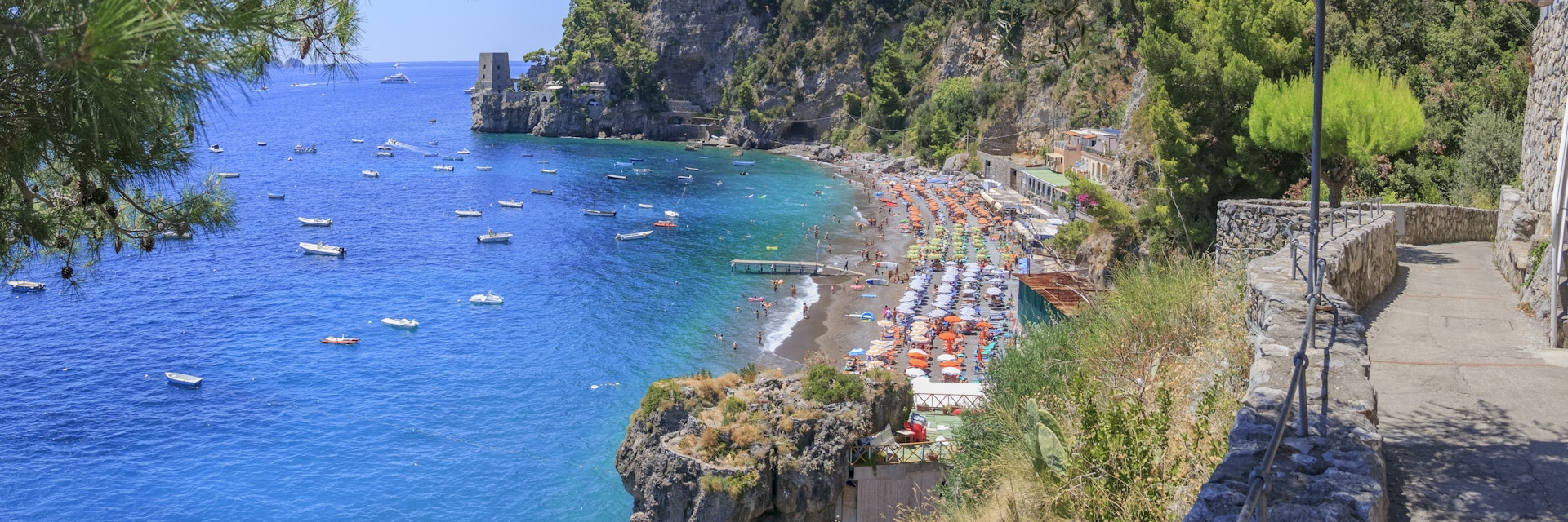 A pathway leads over to the Fornillo Beach, a more peaceful place to lay out your beach blanket and enjoy the surf and sun. You can also take a water taxi to one of the many coves and sandy spots that dot the cliffs that are reachable only by boat.Positano is a seductive place. Terraces shore up the buildings and almost every turn offers a visual bounty to enjoy. The most prevalent point of references is the colorful tiled dome of the Church of Santa Maria Assunta, in the smack-middle of town. Everything else tumbles down toward the water from here. The beach at the marina is known as Spiaggia Grande (big beach) because it is one of the Amalfi Coast's largest. This is the central seafront for the town and there are several excellent seafood restaurants just above the beach.
1332917250