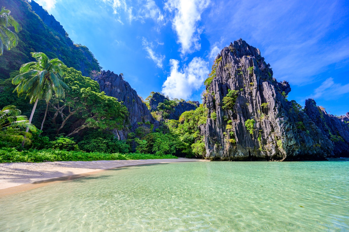 Hidden beach in Matinloc Island, Philippines.